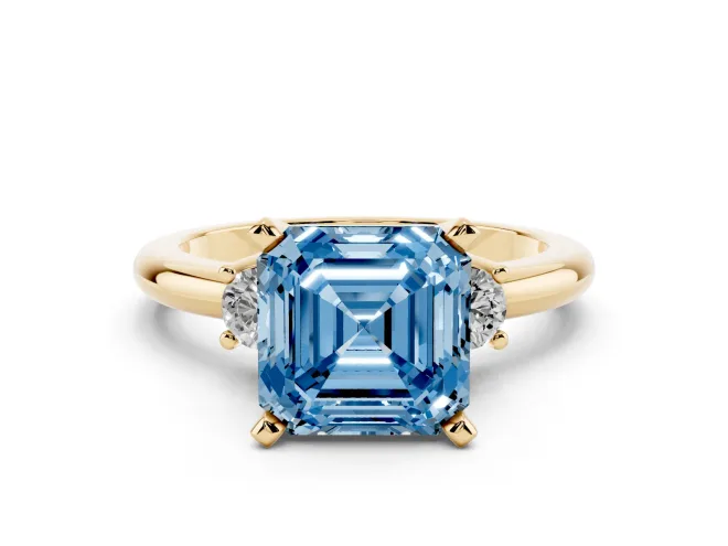 Asscher Cut Three Stone Engagement Ring Setting for a Fancy Blue Lab-Grown Diamond | Round Side Stones | Yellow Gold