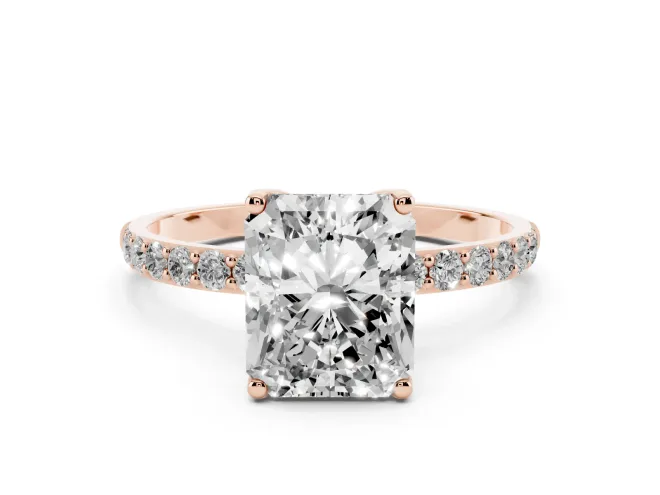 Radiant Cut Diamond Solitaire Engagement Ring Set in Rose gold with Round Pavé Band and Prong Setting