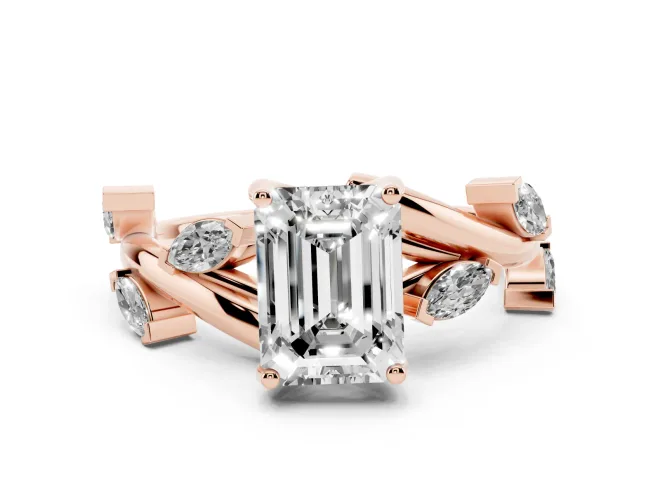 Emerald Cut Diamond Solitaire Ring Set in Rose gold with Twisted Marquise Accent Band
