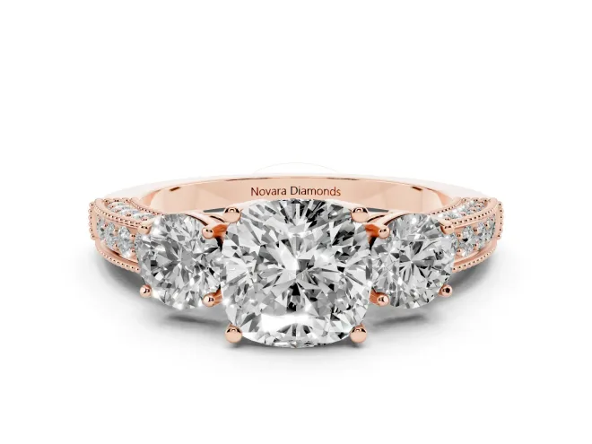 Cushion Cut Diamond Three-Stone Ring Set in Rose gold with Round Side Stones and Pavé Band