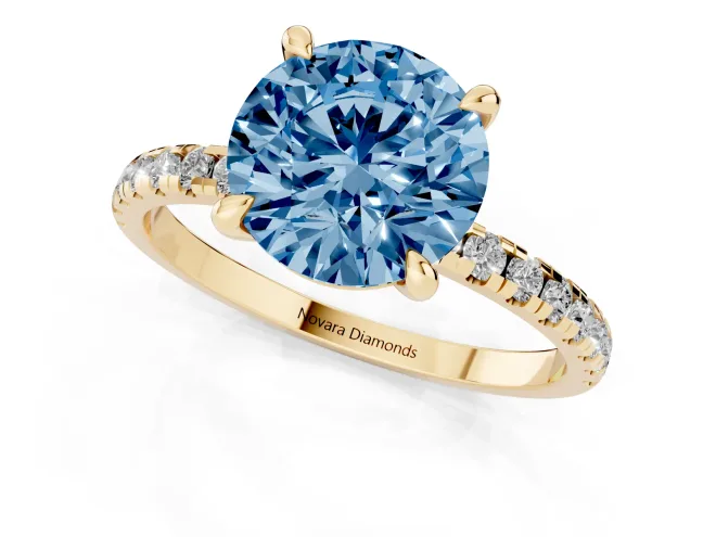 Fancy Blue Round Cut Diamond Brilliant Solitaire Ring Set in Yellow gold with Pavé Band and Prong Setting – second view