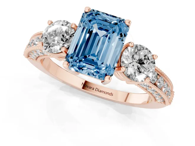 Fancy Blue Emerald Cut Diamond Three-Stone Ring Set in Rose gold with Round Side Stones and Pavé Band – second view