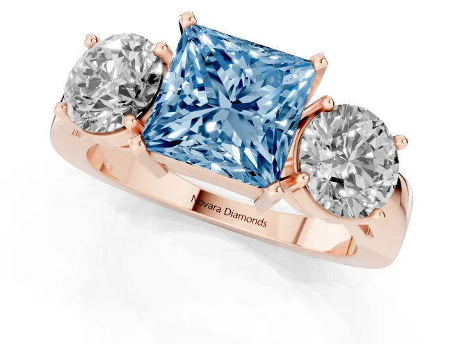 Fancy Blue Princess Cut Diamond Three-Stone Ring Set in Rose gold with Round Side Stones and Classic Band – second view