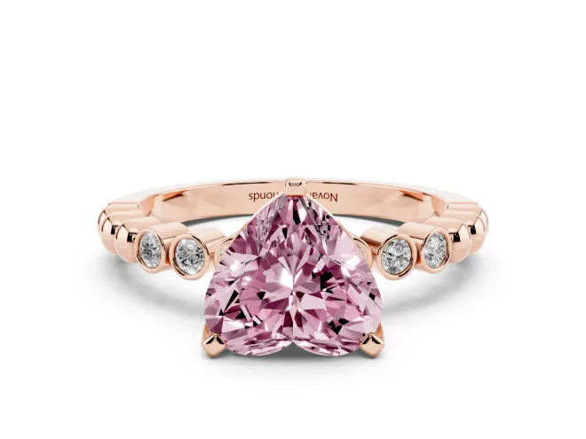 Fancy Pink Heart Cut Diamond Solitaire Engagement Ring Set in Rose gold with Bezel Accents on Beaded Band
