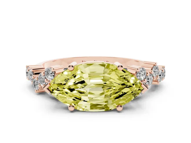 Fancy Yellow Marquise Cut Diamond Ring Set in Rose gold with Scattered Round Accents