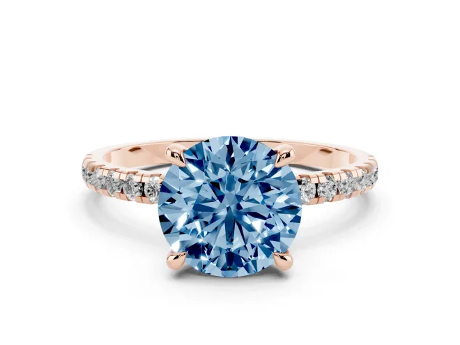Fancy Blue Round Cut Diamond Brilliant Solitaire Ring Set in Rose gold with Pavé Band and Prong Setting