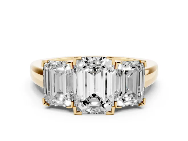 Emerald Cut Diamond Three-Stone Ring Set in Yellow gold with Channel-Set Band and Prong Settings