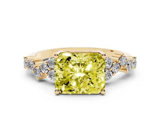 Fancy Yellow Radiant Cut Diamond Ring Set in Yellow gold with Scattered Round Accents