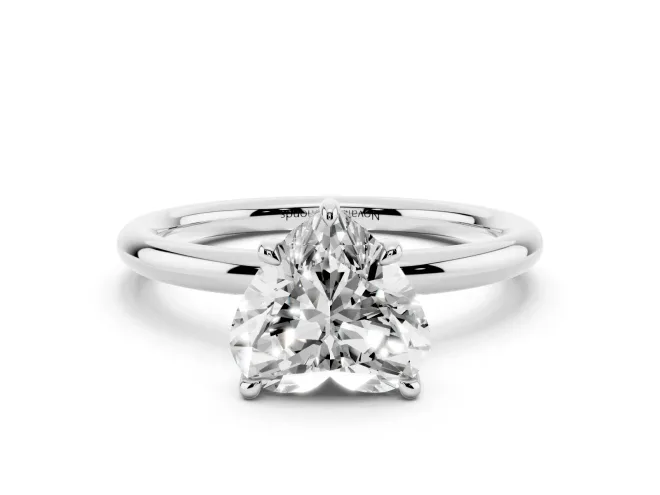 Heart Cut Diamond Solitaire Ring Set in White gold with Thin Band and Prong Setting