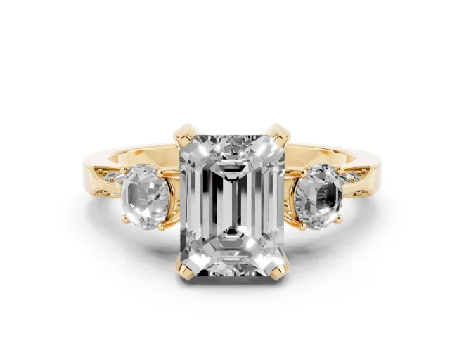 Fancy Black Emerald Cut Diamond Three-Stone Ring Set in Yellow gold with Pavé Band and Smaller Side Stones
