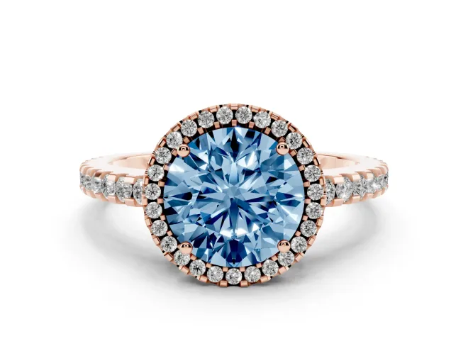 Fancy Blue Round Cut Diamond Halo Ring Set in Rose gold with Pavé Shoulders and Halo-Framed Center