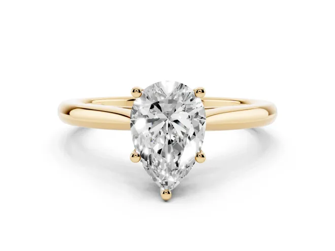 Pear Cut Diamond Solitaire Ring Set in Yellow gold with Cathedral Band and Prong Setting