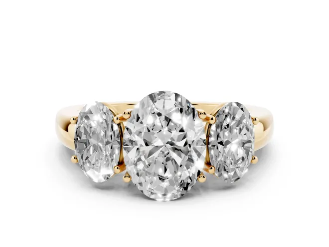 Oval Cut Diamond Three-Stone Ring Set in Yellow gold with Bold Center and Classic Band