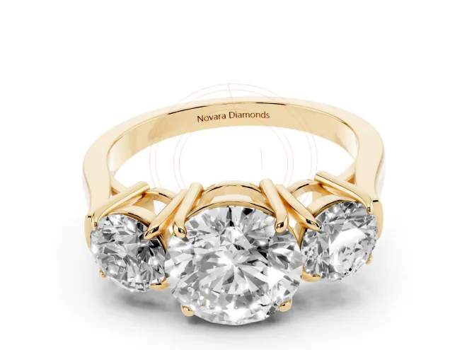 Round Cut Diamond Three-Stone Ring Set in Yellow gold with Round Accent Stones and Plain Band