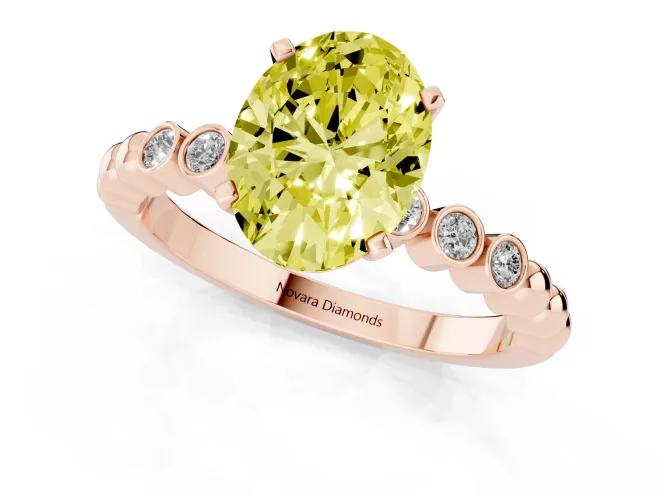 Fancy Yellow Oval Cut Diamond Solitaire Engagement Ring Set in Rose gold with Bezel Accents on Beaded Band – second view