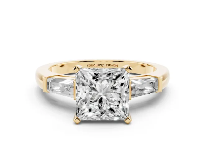 Princess Cut Diamond Solitaire Ring Set in Yellow gold with Tapered Baguette Side Stones and Prong Setting