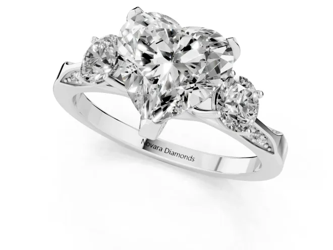 Heart Cut Diamond Three-Stone Ring Set in White gold with Pavé Band and Smaller Side Stones – second view