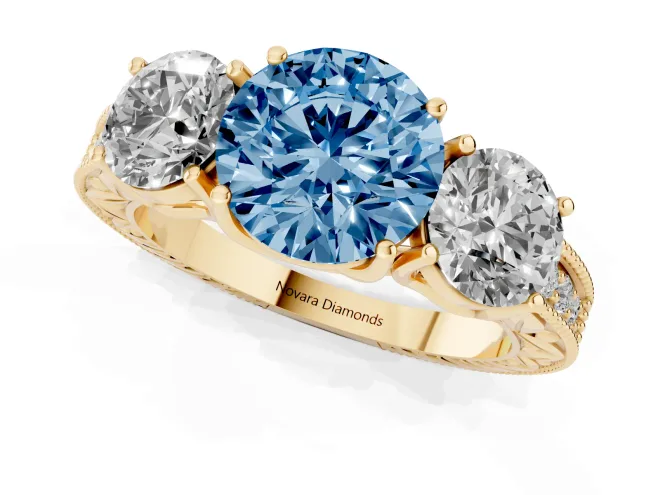 Fancy Blue Round Cut Diamond Three-Stone Engagement Ring Set in Yellow gold with Milgrain Pavé Band – second view