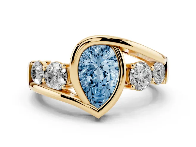 Fancy Blue Pear Cut Diamond Bezel Bypass Ring Set in Yellow gold with Round Accents