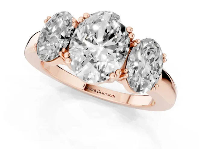 Oval Cut Diamond Three-Stone Ring Set in Rose gold with Polished Band and Prong Setting – second view