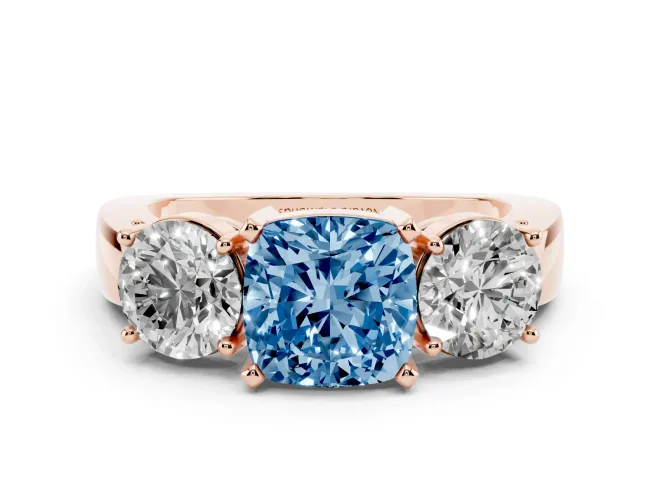Fancy Blue Cushion Cut Diamond Three-Stone Ring Set in Rose gold with Round Side Stones and Classic Band