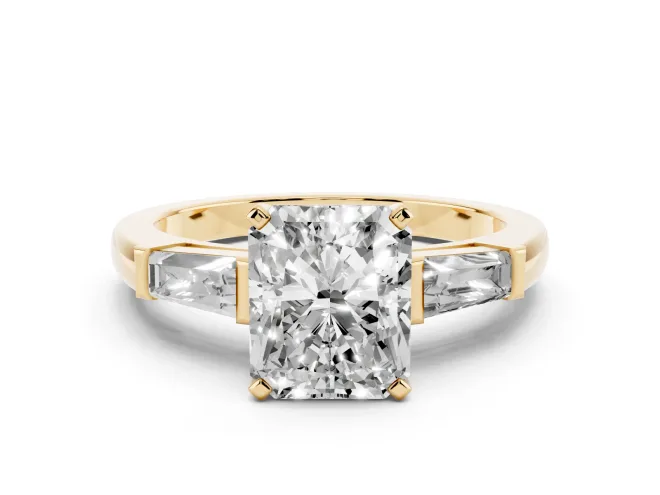 Radiant Cut Diamond Solitaire Ring Set in Yellow gold with Tapered Baguette Side Stones and Prong Setting
