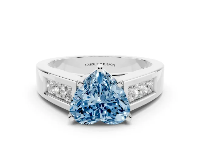 Fancy Blue Heart Cut Diamond Solitaire Ring Set in Platinum with Channel-Set Accent Stones and Prong Setting
