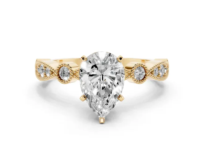 Pear Cut Diamond Solitaire Engagement Ring Set in Yellow gold with Milgrain Bezel Accent Band