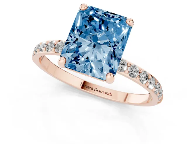 Fancy Blue Radiant Cut Diamond Solitaire Ring Set in Rose gold with Round Pavé Band and Prong Setting – second view