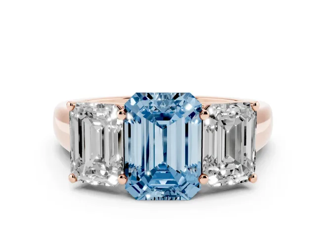 Emerald Cut Three Stone Engagement Ring Setting for a Fancy Blue Lab-Grown Diamond | Basket Prong Heads | Rose Gold