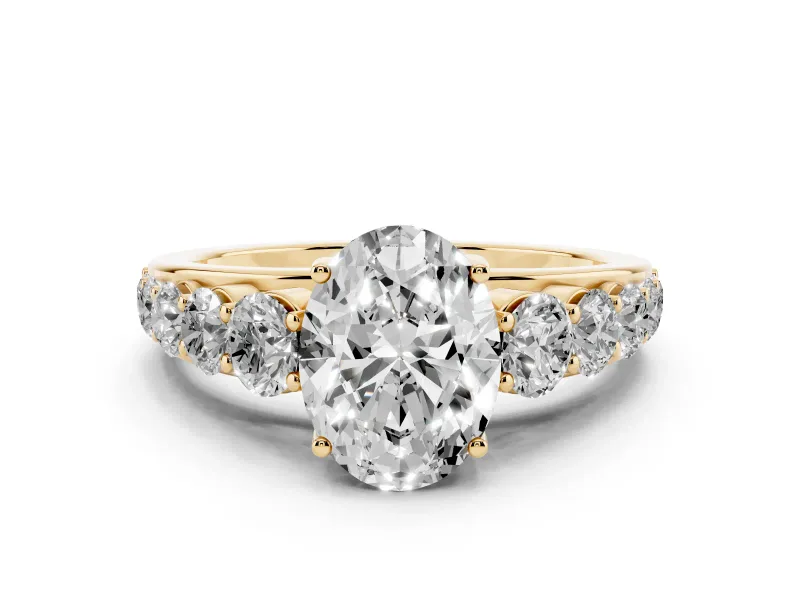 Oval Cut Diamond Solitaire Ring Set in Yellow gold with Pavé-Set Band and Prong Setting