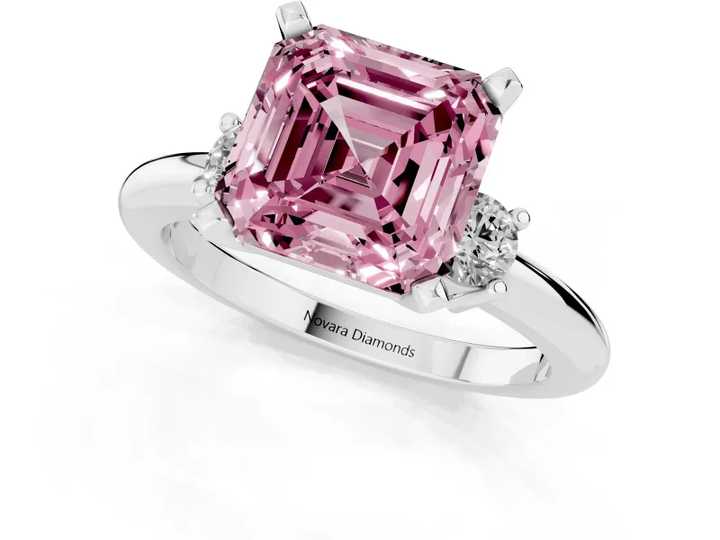 Fancy Pink Three-Stone Asscher Cut Diamond Ring Set in Platinum with Prong Setting and Plain Band
