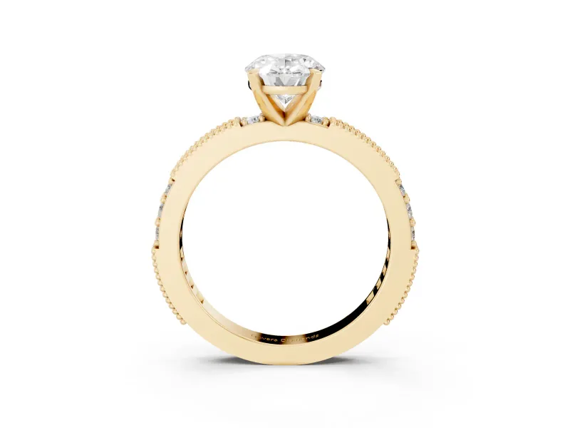 Oval Cut Diamond Solitaire Ring Set in Yellow gold with Slim Pavé Band and Prong Setting
