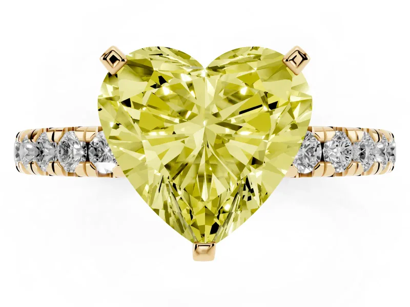 Fancy Yellow Heart Cut Diamond Pavé Solitaire Ring Set in Yellow gold with Round Band and Prong Setting
