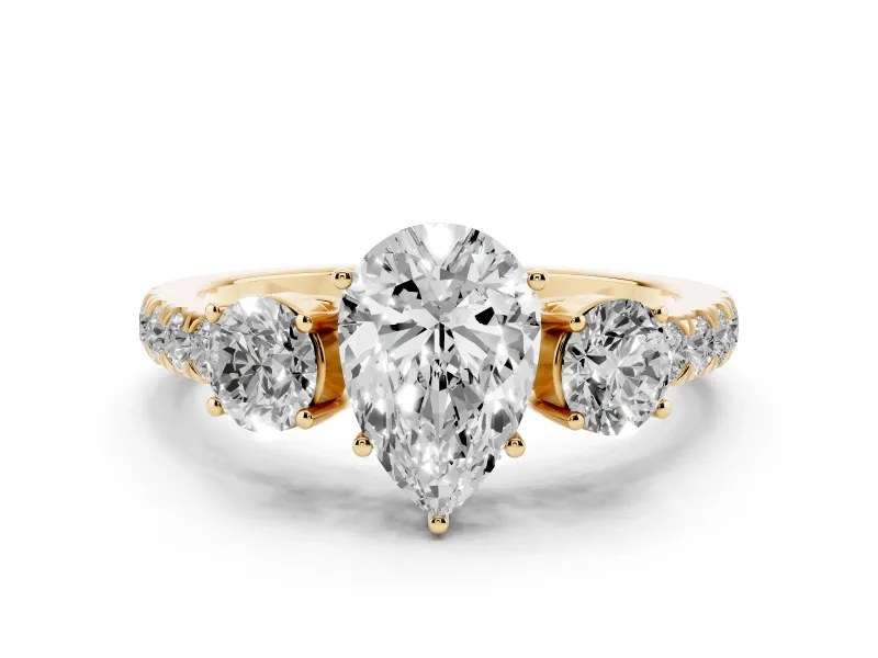 Pear Cut Diamond Three-Stone Ring Set in Yellow gold with Round Side Stones and Delicate Pavé Band