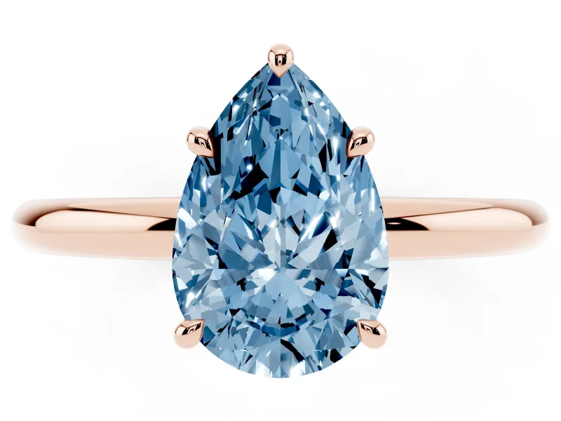 Fancy Blue Pear Cut Diamond Solitaire Ring Set in Rose gold with Thin Band and Prong Setting