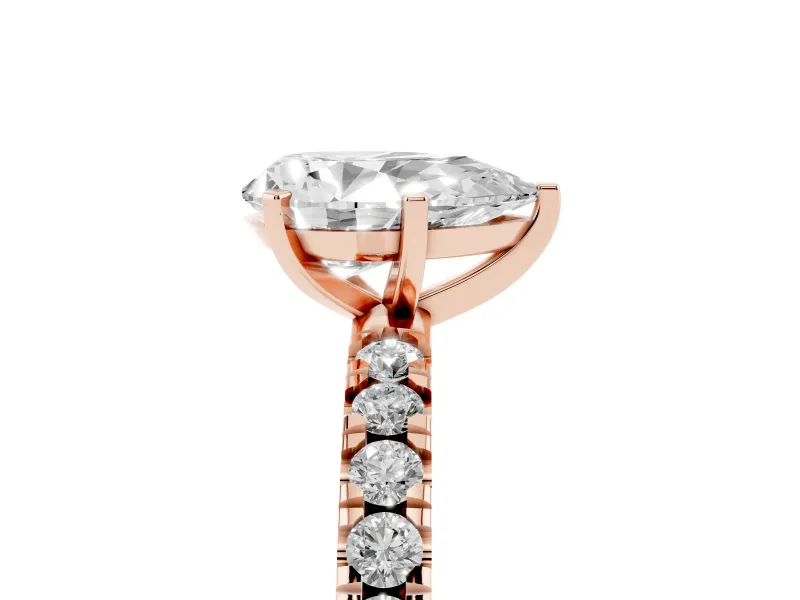 Pear Cut Diamond Pavé Band Solitaire Set in Rose gold with Prong Setting