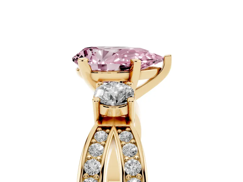 Fancy Pink Three-Stone Pear Cut Diamond Twist Band Ring Set in Yellow gold with Pavé Accents and Prong Setting