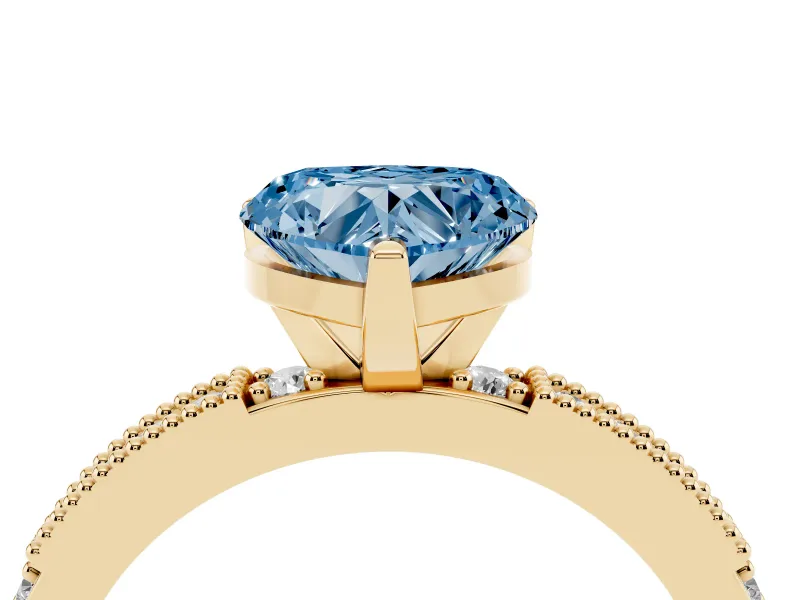 Fancy Blue Heart Cut Diamond Solitaire Ring Set in Yellow gold with Slim Pavé Band and Prong Setting