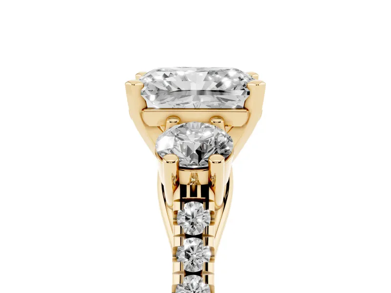 Three-Stone Radiant Cut Diamond Pavé Band Ring Set in Yellow gold with Prong-Set Trio