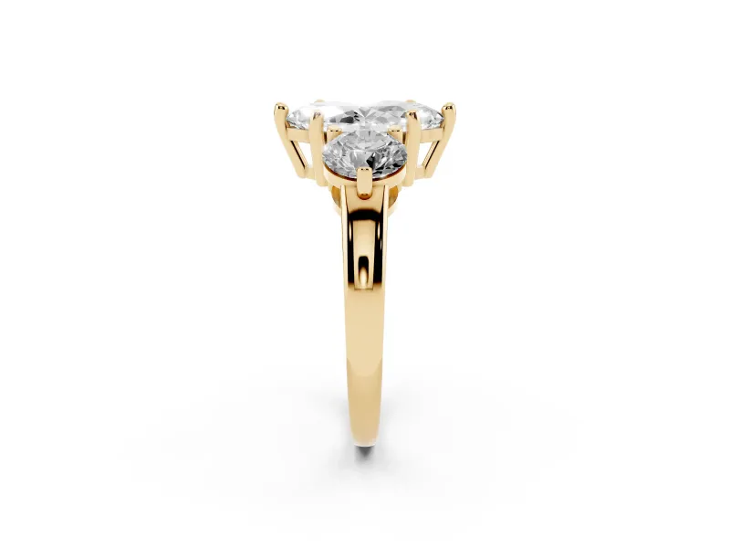 Marquise Cut Diamond Three-Stone Ring Set in Yellow gold with Prong Setting and Classic Band