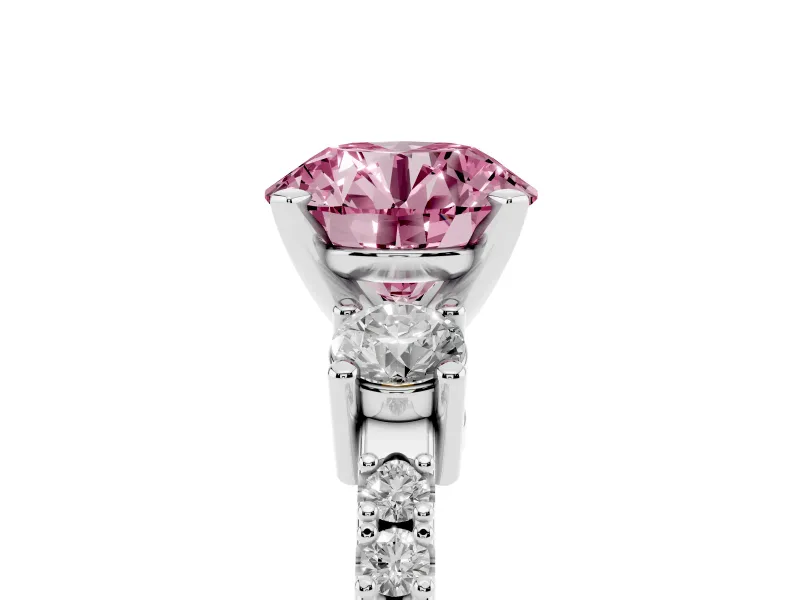 Fancy Pink Three-Stone Round Cut Diamond Pavé Band Ring Set in White gold with Prong Setting