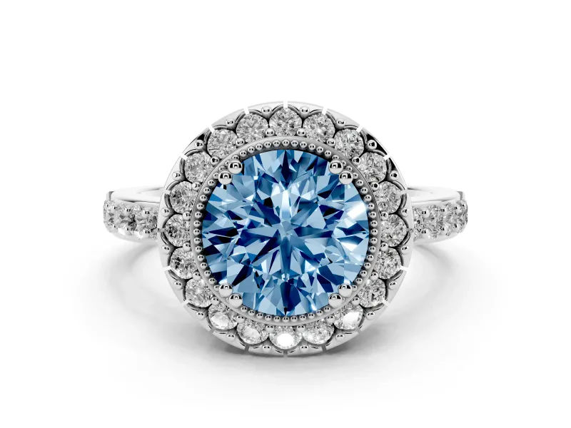 Fancy Blue Round Cut Diamond Halo Ring Set in White gold with Pavé Shank and Prong Setting
