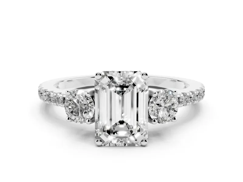 Emerald Cut Diamond Three-Stone Ring Set in Silver with Pavé Band and Graduated Sides