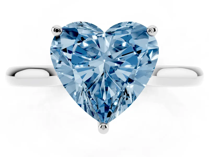Fancy Blue Heart Cut Diamond Solitaire Ring Set in Platinum with Cathedral Band and Prong Setting