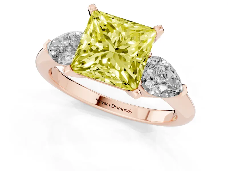 Fancy Yellow Three-Stone Princess Cut Diamond Ring Set in Rose gold with Pear Side Stones and Prong Setting