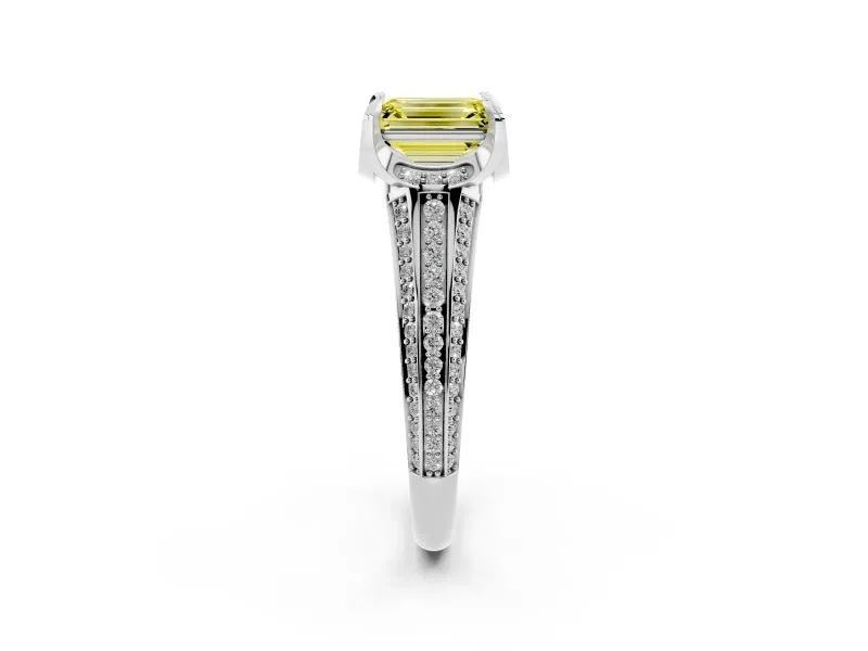 Fancy Yellow Emerald Cut Diamond Pavé Split Shank Solitaire Ring Set in White gold with Prong Setting