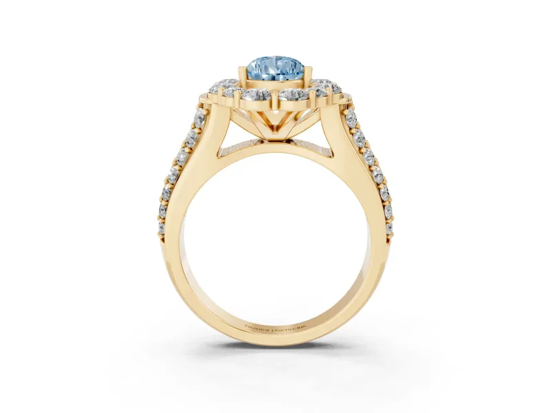 Fancy Blue Pear Cut Diamond Halo Engagement Ring Set in Yellow gold with Split Shank and Prong Setting