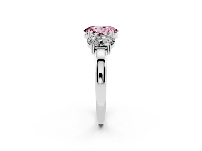 Fancy Pink Oval Cut Diamond Three-Stone Ring Set in White gold with Polished Band and Prong Setting