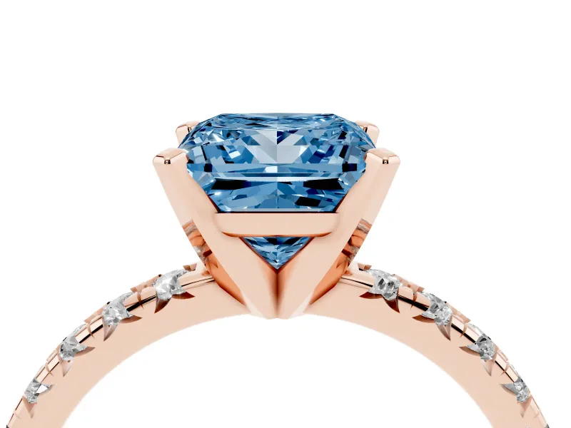 Fancy Blue Princess Cut Diamond Solitaire Pavé Engagement Ring Set in Rose gold with Round Band and Prong Setting